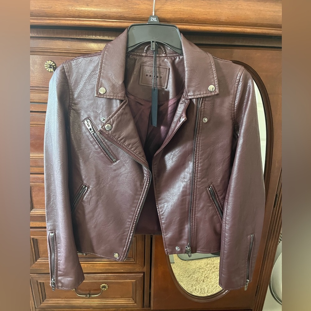 Blank YNC Moto jacket. Never worn, faux leather, flattering fit, excellent cond.